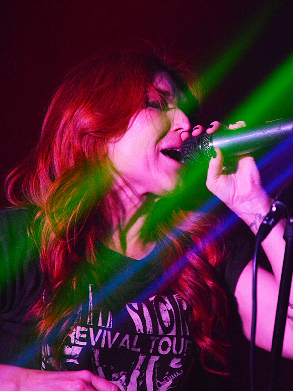 Drowning Mona's lead singer on stage at Fitzgerald's Bar and Live Music Venue in San Antonio on Friday, May 17, 2024. - photo by Joe Alexander