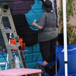 New mural being created during Paint Jam at Essex Modern City in San Antonio on May 11, 2024. – photo by Joe Alexander