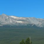 A last bit of snow clings to the mountain along Highway 285 between Leadville and Del Norte in Colorado, in August 2024. - photo by Joe Alexander
