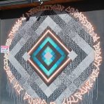 Mural in the Art District on Santa Fe in downtown Denver, Colorado. - photo by Joe Alexander