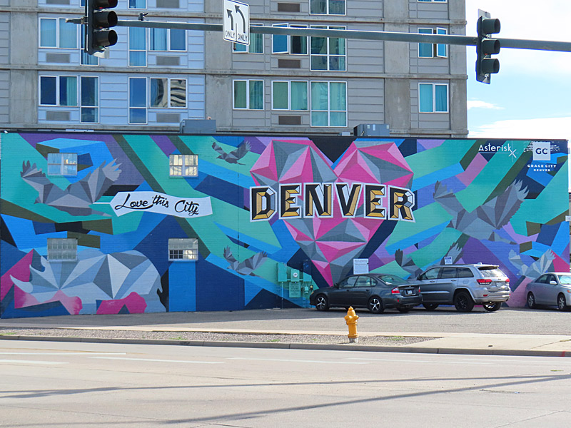 Love This City Denver mural by Pat Milbery on Art District on Santa Fe in downtown Denver, Colorado. The colors of the mural will look much brighter if you catch it on a sunny afternoon. - photo by Joe Alexander