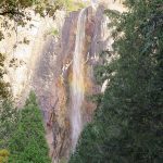 Bridal Veil Falls is brought to light by full sunlight by late afternoon. Even at the end of autumn when the water levels in Yosemite Falls are lower, it is a an impressive sight. – photo by Joe Alexander