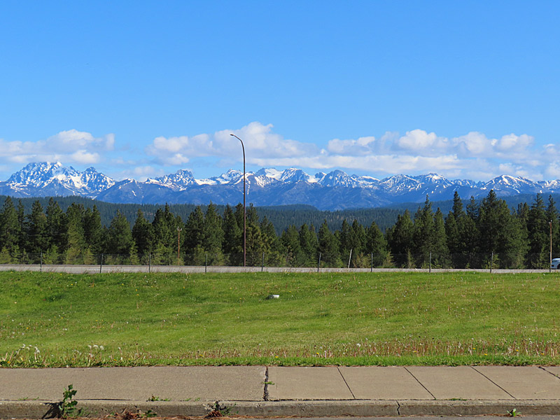 The peaks of the Alpine Lakes Wilderness in Washington State still had some snow in late May and are visible to the north of the Indian John Hill Rest Area along Interstate 90. - photo by Joe Alexander