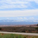 The La Sal Mountains in southeastern Utah. View is looking east from Utah Highway 191 driving south toward Moab. - photo by Joe Alexander