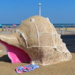Public near the boardwalk in Virginia Beach. - photo by Joe Alexander