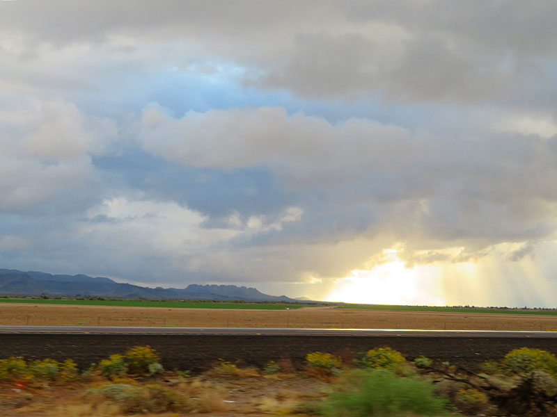 Early morning rain storm in the Arizona desert between Phoenix and Tucson. - photo by Joe Alexander