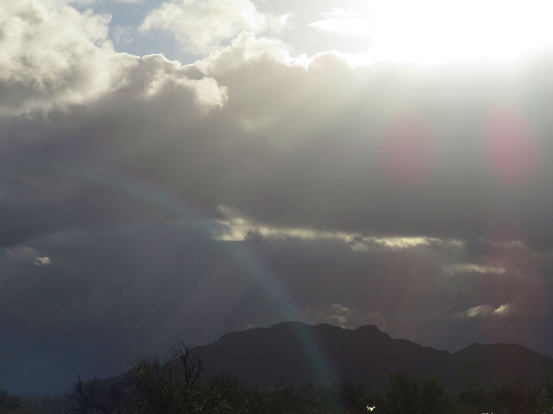 Early morning rain storm in the Arizona desert between Phoenix and Tucson. - photo by Joe Alexander