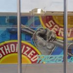 Studebaker mural by Los Otros Murals on Broadway Street in downtown San Antonio.
