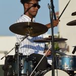 The Chris Cuevas Project played as the setting sun lit up Commons Park at the Rim on San Antonio’s north side on Wednesday, Aug. 2, 2023. – photo by Joe Alexander