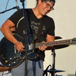 The Chris Cuevas Project played as the setting sun lit up Commons Park at the Rim on San Antonio’s north side on Wednesday, Aug. 2, 2023. – photo by Joe Alexander