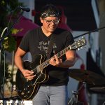 The Chris Cuevas Project played as the setting sun lit up Commons Park at the Rim on San Antonio’s north side on Wednesday, Aug. 2, 2023. – photo by Joe Alexander