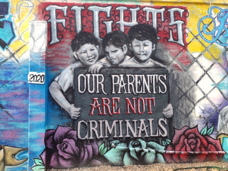 One of the “Love Fights Back” murals at Pr1mitive Ink tattoo shop in Glendale, Arizona.