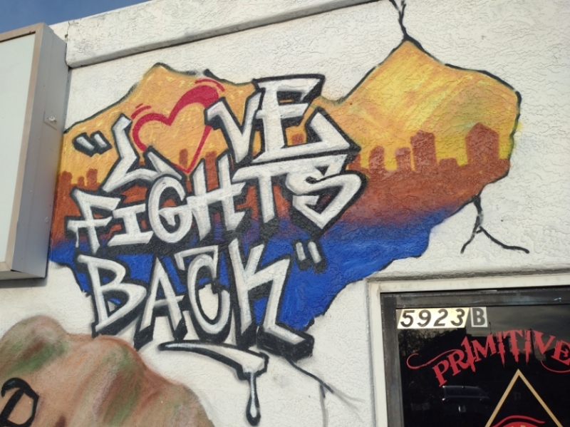 One of the “Love Fights Back” murals at Pr1mitive Ink tattoo shop in Glendale, Arizona. This art is near the front door.