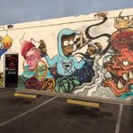 One of the “Love Fights Back” murals at Pr1mitive Ink tattoo shop in Glendale, Arizona.