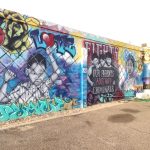 One of the “Love Fights Back” murals at Pr1mitive Ink tattoo shop in Glendale, Arizona.