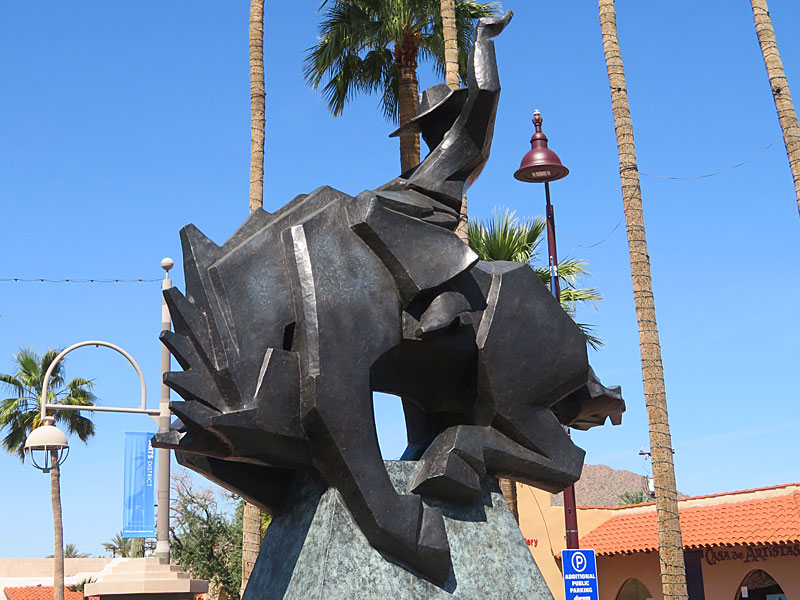 Cowboy statue the "Jack Knife" by Ed Mell in Old Town Scottsdale, Arizona.