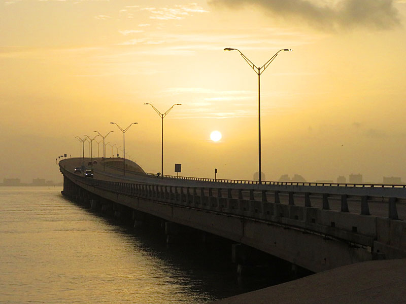 View of the Queen Isabella Causeway looking toward South Padre Island from the area near the Port Isabel Lighthouse on a cloudy morning in June. - photo by Joe Alexander