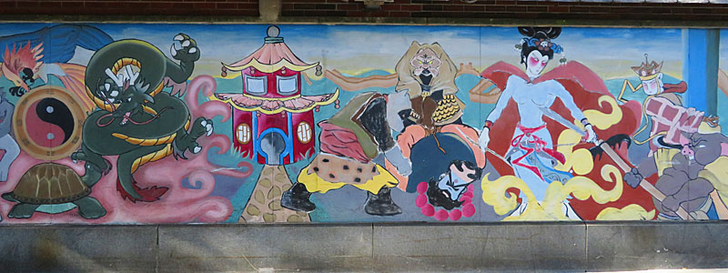 There are a number of brightly colored murals in Boston’s Chinatown. – photo by Joe Alexander