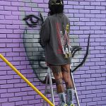 Mural in progress at Viva Fiesta Paint Jam facing Guadalupe Street at South Flores Street.