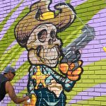 Mural in progress at Viva Fiesta Paint Jam facing Guadalupe Street at South Flores Street.