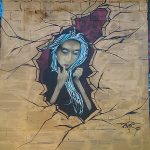 This is part of a block-long street mural on Hoefgen Street just south of Carolina a few blocks from the Alamodome in downtown San Antonio.