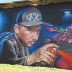 This is part of a block-long street mural on Hoefgen Street just south of Carolina a few blocks from the Alamodome in downtown San Antonio.