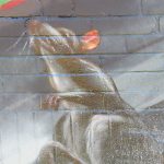 This is part of a block-long street mural on Hoefgen Street just south of Carolina a few blocks from the Alamodome in downtown San Antonio.