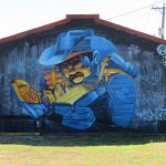 This is part of a block-long street mural on Hoefgen Street just south of Carolina a few blocks from the Alamodome in downtown San Antonio.